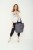 kobieta z pojemną elegancką szarą torbą miejską z cordury cargo by owee